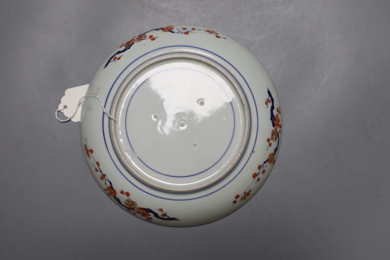 An 18th century Japanese Arita dish, 32cm, and another similar.